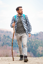 Load image into Gallery viewer, Man wearing Mushroom Identification T-shirt while on a hike