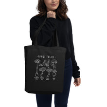 Load image into Gallery viewer, Woman holding tote bag with Toxic Mushroom Identification design
