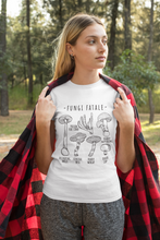 Load image into Gallery viewer, Woman wearing t-shirt with Toxic Mushroom Identification print
